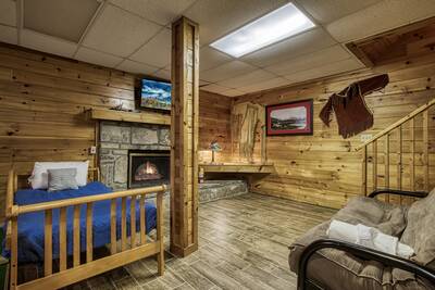 Caddy Shack Lodge lower level game room with futon
