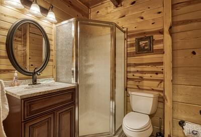 Caddy Shack Lodge main level bathroom with walk in shower