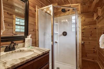 Caddy Shack Lodge upper level bathroom with walk in shower