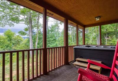 Pleasant View screened in front porch with hot tub