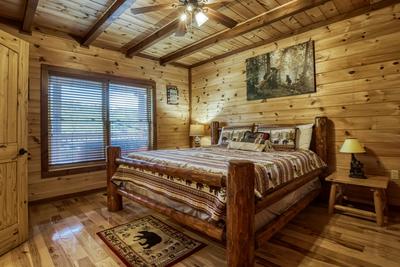 The Bear Cubs upper level bedroom with king size bed