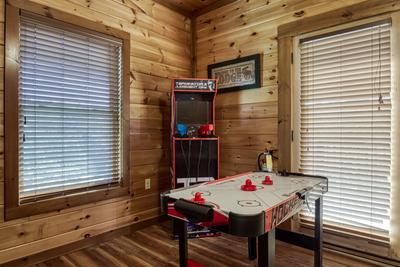 The Bear Cubs upper level loft area with air hockey table