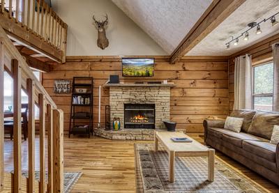 Owl's Nest living room with wood burning fireplace