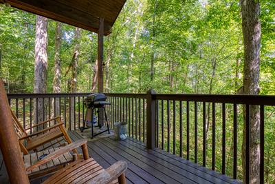 Angels Gift covered back deck with rocking chairs