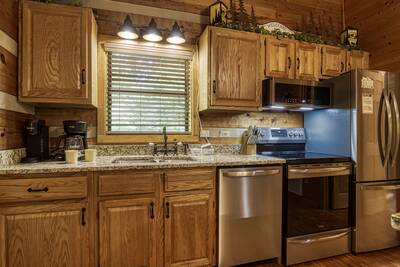 Unforgettable fully furnished kitchen with stainless steel appliances