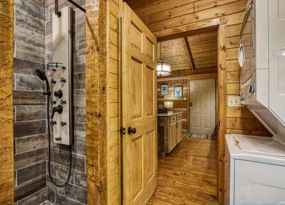 Unforgettable walk in spa shower and washer and dryer
