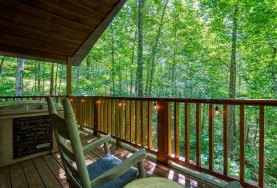 Unforgettable covered back deck with hot tub