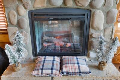 Bear's View - Seasonal stone encased gas log fireplace
