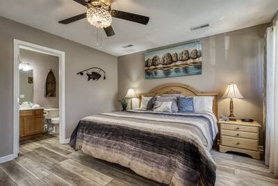 Striking Waters bedroom with a king size bed