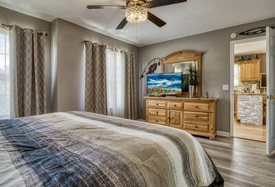 Striking Waters bedroom with 50 inch TV