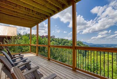 Chasing Views covered back deck with panoramic mountain views