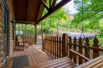 Allen Hideaway covered entry deck with rocking chair