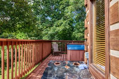Builtmore Hideaway front deck with corn hole