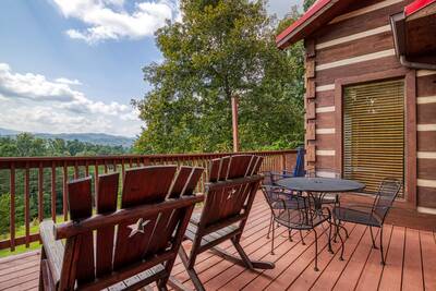 Builtmore Hideaway front deck with rocking chairs