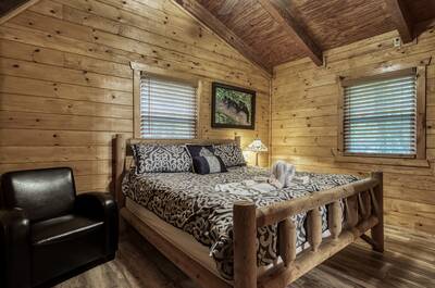Whispering Winds upper level bedroom with king size bed