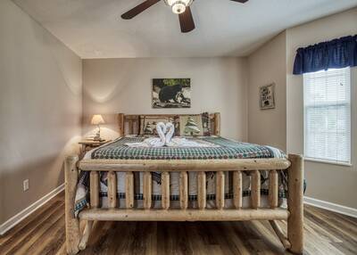 River Escape bedroom with king size log bed