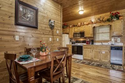 Bearfootin dining area and kitchen