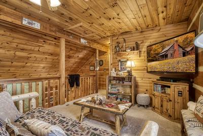 Mountain Magic upper level loft area with 65 inch TV