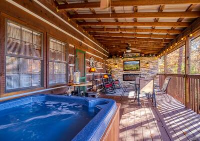 Mountain Magic covered back deck with hot tub