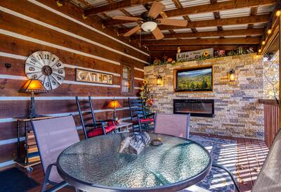Mountain Magic covered back deck with TV and electric fireplace