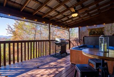Mountain Magic covered back deck with 