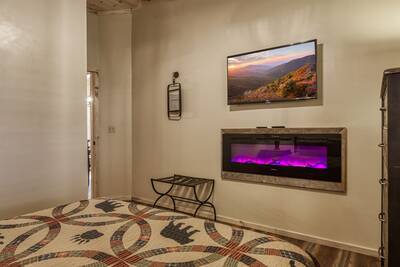 Margaritas at Sunrise bedroom with year round electric fireplace