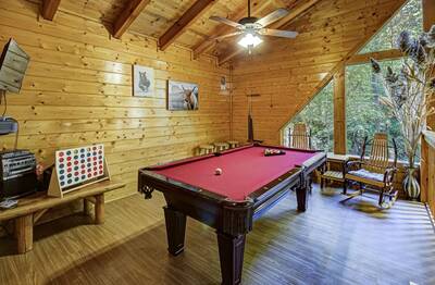 Creekview pool table in loft area