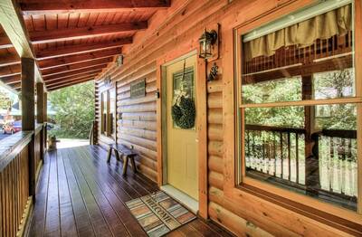 Creekview covered entry deck