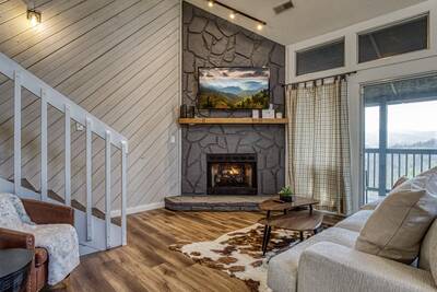 Peak of Perfection living room with gas fireplace