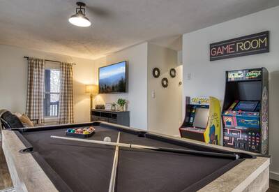 Peak of Perfection game room with pool table