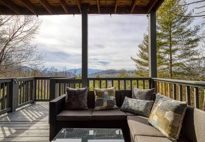 Peak of Perfection covered back deck with outdoor couches