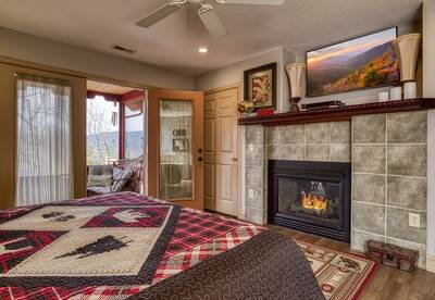 Sunset View Chalet king size bed and seasonal gas fireplace