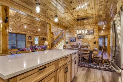 Cozy Cub Cabin kitchen island and dining area