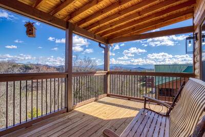 Cozy Cub Cabin upper level deck with mountain views