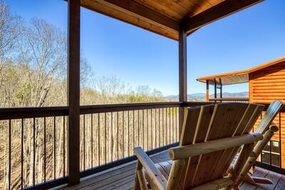 Singing in the Smokies main level covered back deck with mountain views