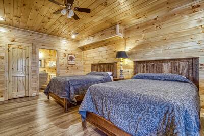 Singing in the Smokies lower level bedroom with 2 queen size beds