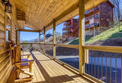 Singing in the Smokies covered entry deck with custom bench