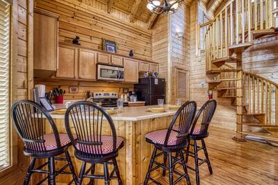 River Cabin bar top and spiral staircase