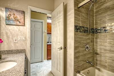 Smoky Mountain Legacy Condo bathroom with tub/shower combo