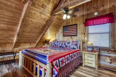 Old Glory loft area bedroom with king size bed