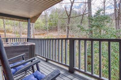 Lakeview covered back deck with hot tub