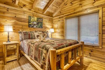 Down by the River bedroom with queen size bed