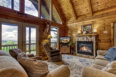 Awesome View living room with seasonal gas log fireplace
