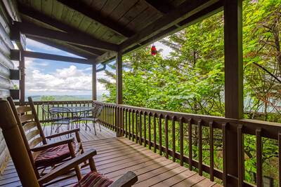 Awesome View main level covered deck with rocking chairs