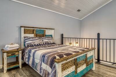 Lake View Therapy queen size bed in upper level loft area
