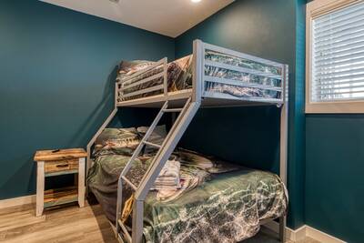Lake View Therapy lower level bedroom with twin over full bunk bed