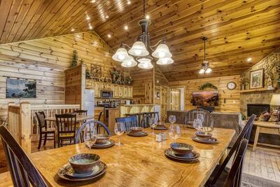 Getaway Mountain Lodge dining table, living room, and fully furnished kitchen