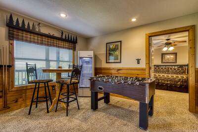 Getaway Mountain Lodge lower level game room with foosball table