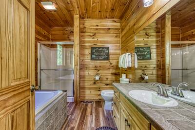 Antler Run main level bathroom one with walk in shower and Whirlpool tub