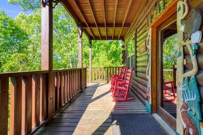 Antler Run covered entry deck with rocking chairs